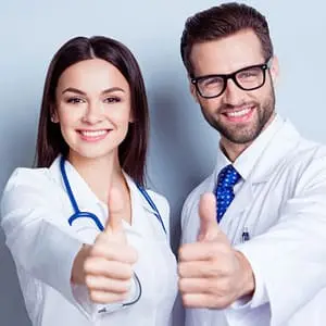 patient and dentist discussing dental treatments at a dental clinic
